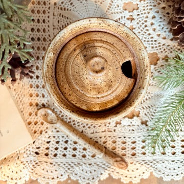 Stoneware pot with spoon