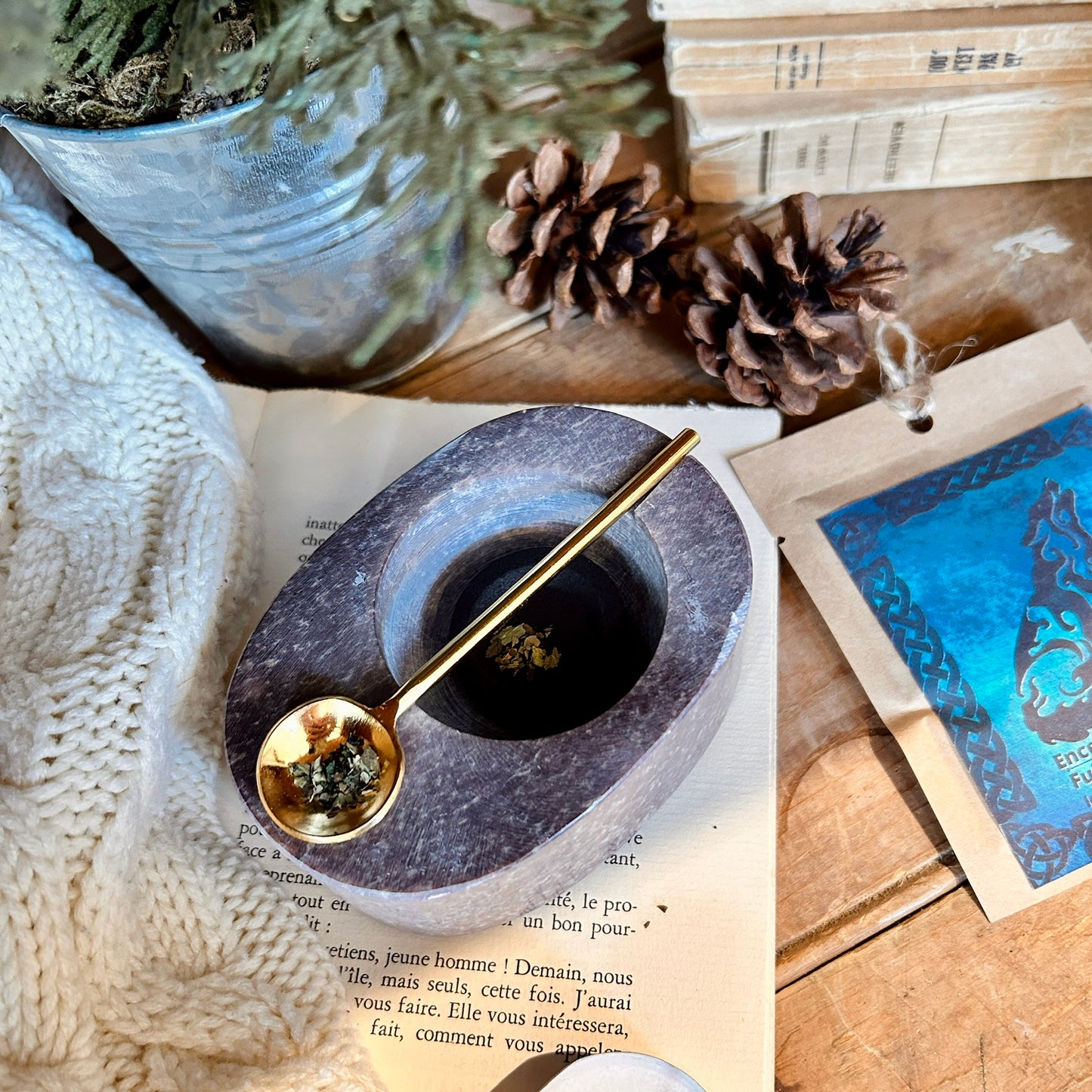 Incense holder with small spoon