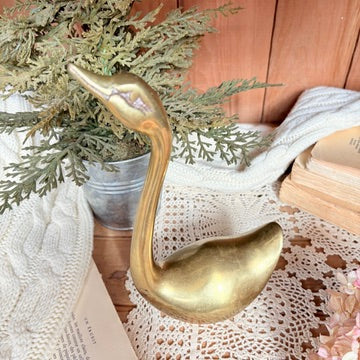 brass swan