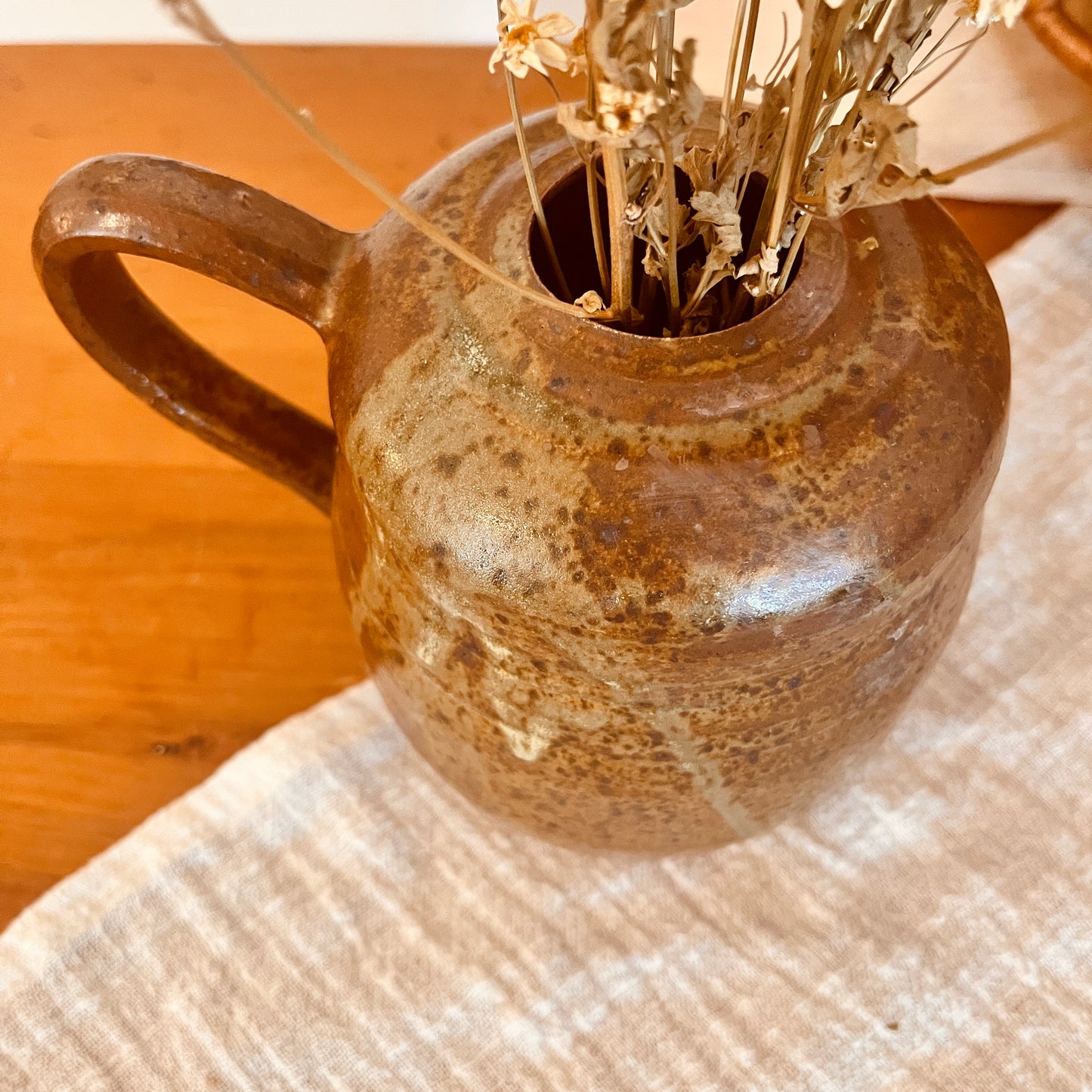 Stoneware vase with handle