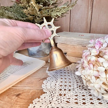 Brass sailboat bell