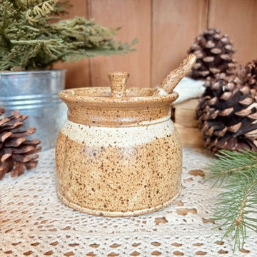 Stoneware pot with spoon