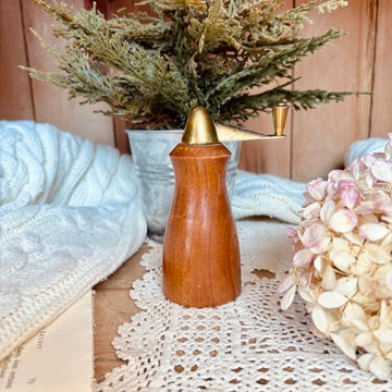 Wood and brass pepper shaker