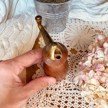 Wood and brass pepper shaker