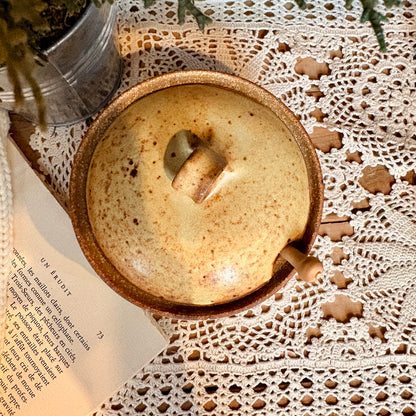 Stoneware pot with spoon