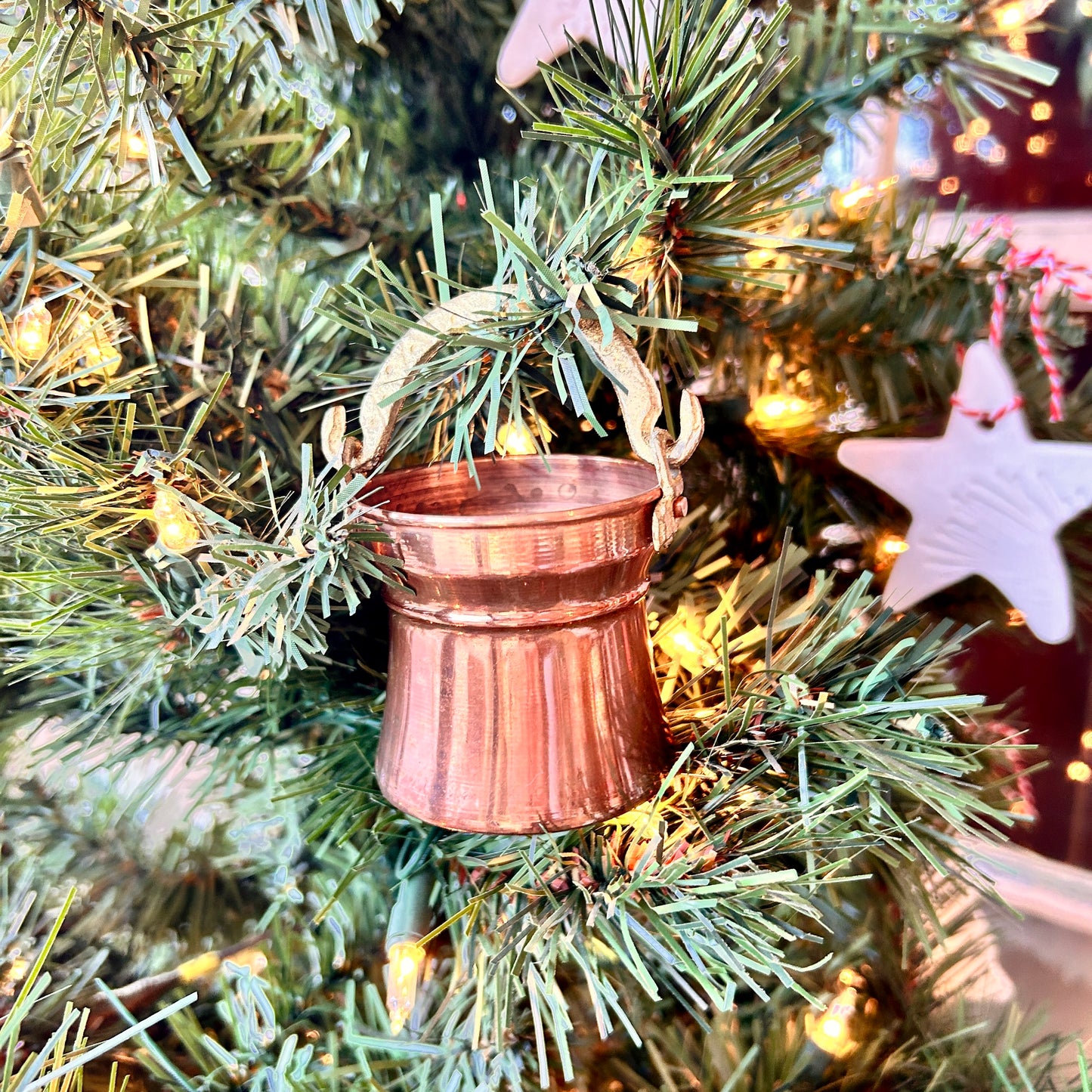 Trio of copper pots