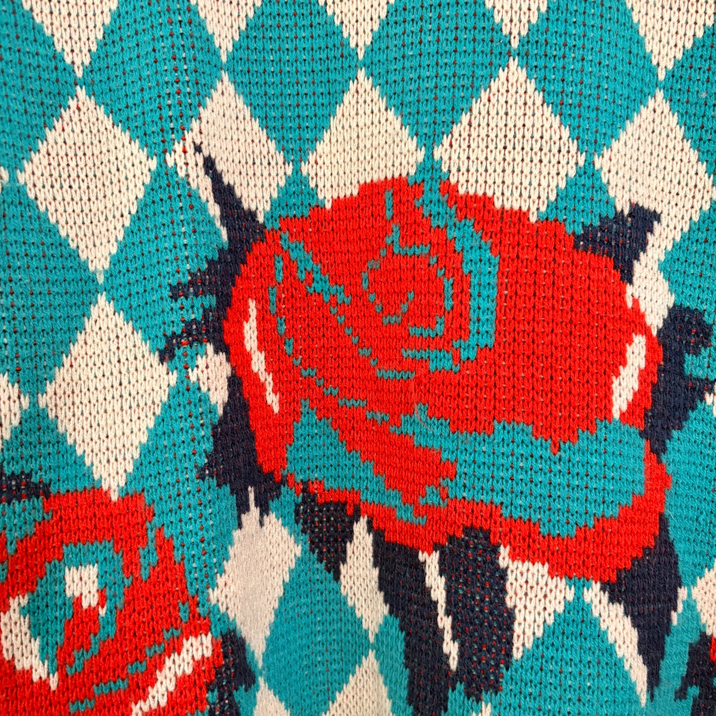 Turquoise diamond pattern sweater