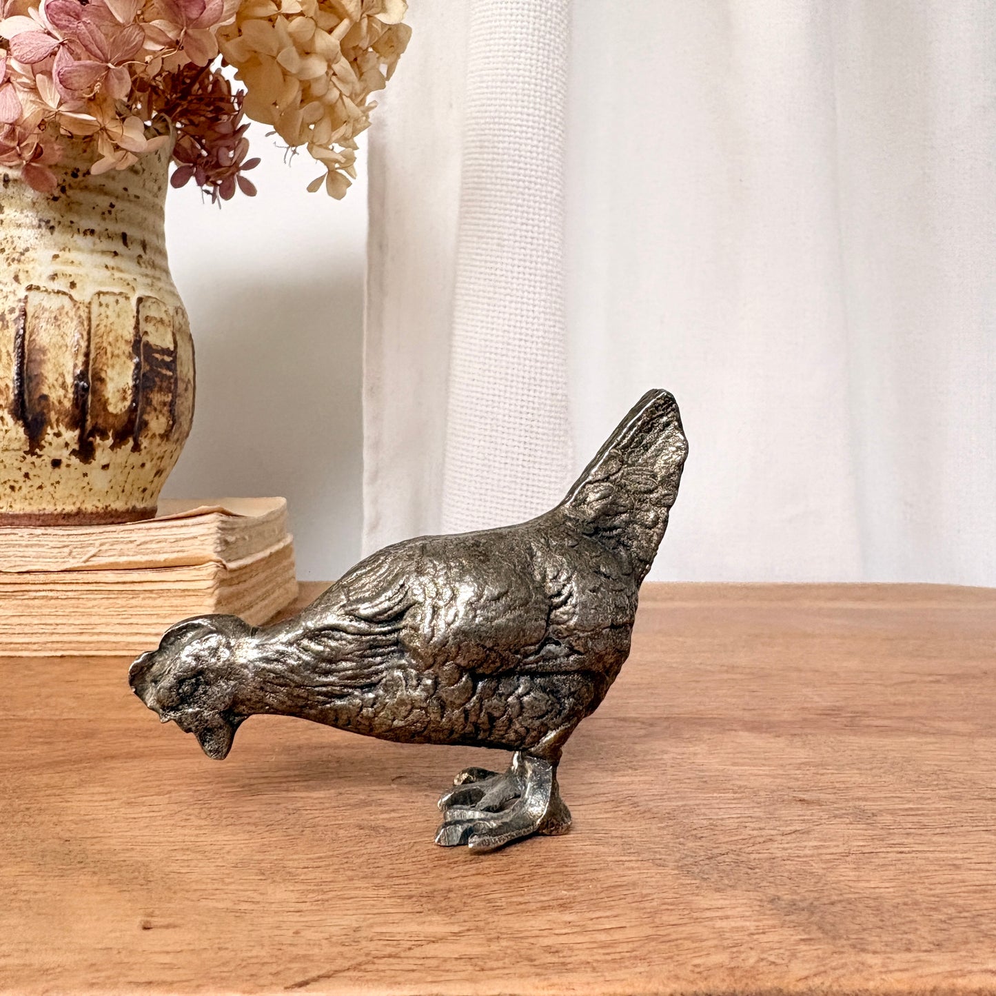 Mini poule en métal argenté